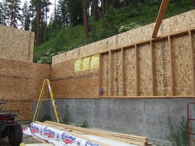 OSB is almost all up; when construction resumes, the stairway can go up.