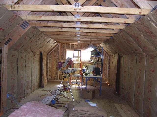 Looks like it ceiling is all insulaated, just needs osb put on.