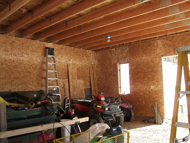 Finally getting some more insulation and osb downstairs in the "barn"