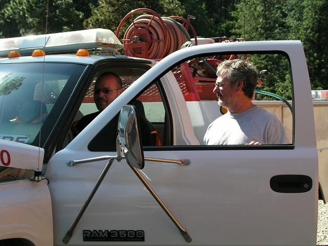 June also brought Mike, Sally and Anthony. Mike and Curtis checking out the fire truck.