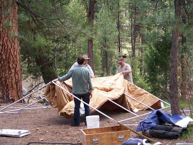 Curtis, Paul and Anthony put up the tent.