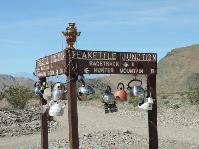 The junction sign. Tea kettles are constantly added and removed every year.