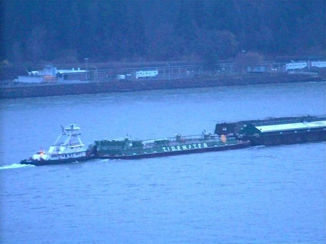 Early evening, but still light enough to photo a barge.