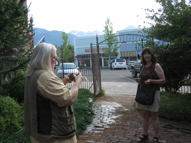 Jane and Judy touring downtown Joseph and taking pictures of all the sculptures.