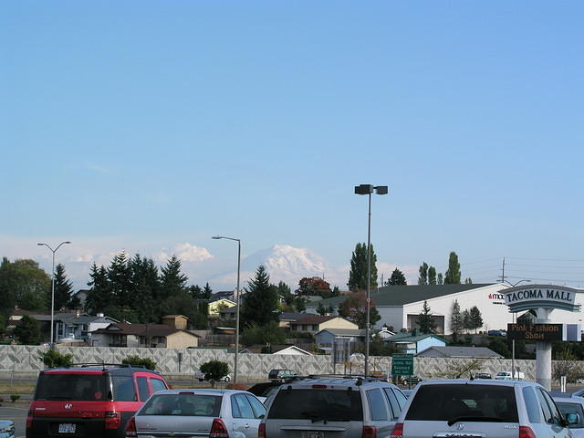 It is hard to distinguish Mt. Ranier from the clouds by it.