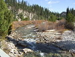 A creek going to the Boise River. You can see from all the rocks, t has been dredged for gold.