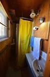 The shower room of cabin one; the toilet is outside.
