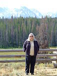 Jane standing before the mountains.