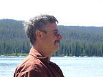 Curtis standing by Red Fish lake.