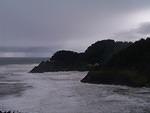 The Oregon Coast gets a lot of rain. The big waves carry a lot of sand. 